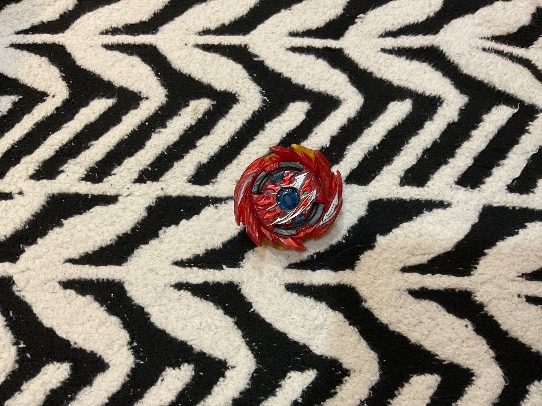 Beyblade Burst Super Hyperion Xceed 1A (Category: Action & Battle Toys) located in Manila. Submitted by rylansstuff (Listing ID 1464461855, Image 1). Description: - Red and silver Brave Valtryek V6 Beyblade - Perfect for intense battles - Ready for its next champion - Authentic - SF shouldered by buyer - PM for further questions .