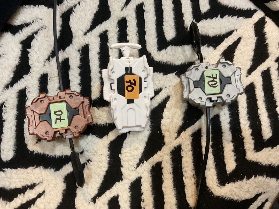 Beyblade Launchers (3 pcs) (Category: Action & Battle Toys) located in Manila. Submitted by rylansstuff (Listing ID 1464456806, Image 1). Description: - Set of 3 Beyblade string launchers - Colors: White, Bronze, Silver - Reported to be in good working condition - Ideal for Beyblade players - Idk if it’s authentic - ₱70 each ₱200 for all - SF shouldered by the buyer - PM for further questions - Note: White string launcher is kinda loose - White: 