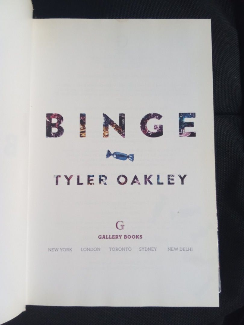 Binge by Tyler Oakley (Category: Storybooks) located in Pasig City. Submitted by teebeedeee (Listing ID 1464396586, Image 2). Description: - Binge by Tyler Oakley - hardcover edition - Collection of essays and personal stories - Features vibrant and eye-catching cover art - Pages are clean and well-maintained - Spine is intact - Ideal for fans of Tyler Oakley preowned hardcover book complete pages plastic covered.no visible penmarks for meetups i