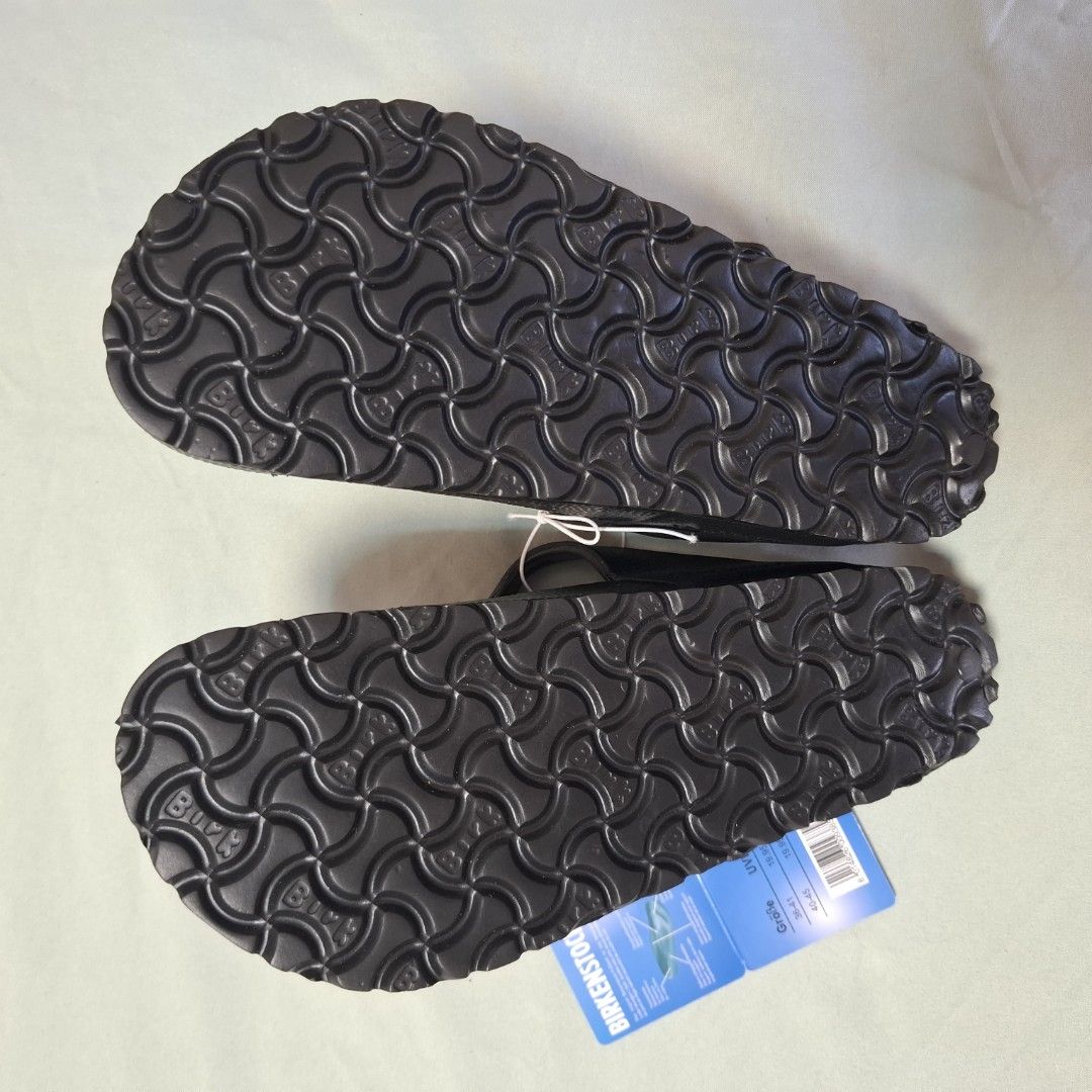 Birkenstock Gizeh Black EVA Sandals Size 5 (Category: Flats & Sandals) located in Malolos. Submitted by pure.cosmicwater (Listing ID 1464376549, Image 3). Description: - Brand: Birkenstock - Model: Gizeh - Color: Black - Material: EVA - Size: 5 - Features: Waterproof, easy to clean, classic Birkenstock sole pattern - Perfect for: Casual wear, beach.