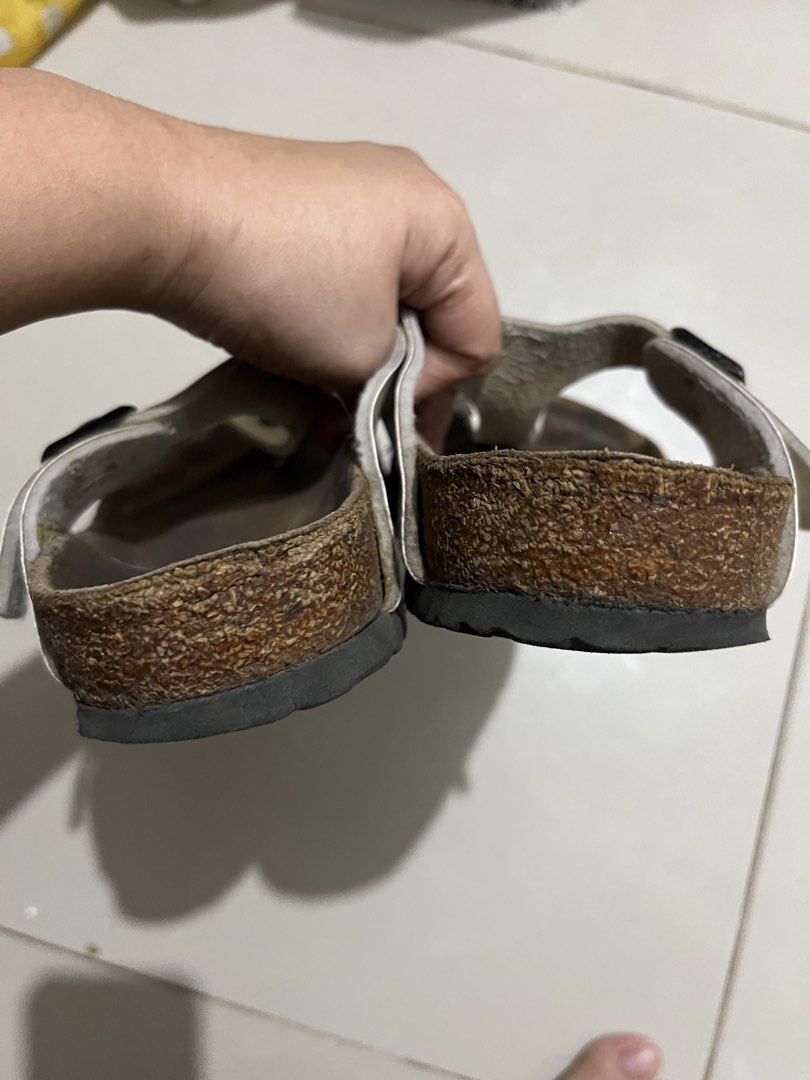 Birkenstock Gizeh White Patent Sandals (Category: Flats & Sandals) located in Imus. Submitted by louiemarie (Listing ID 1464545547, Image 2). Description: - Birkenstock Gizeh sandals - Color: White - Material: Leather straps with adjustable buckle - Footbed: Cork - Style: Comfortable and classic.