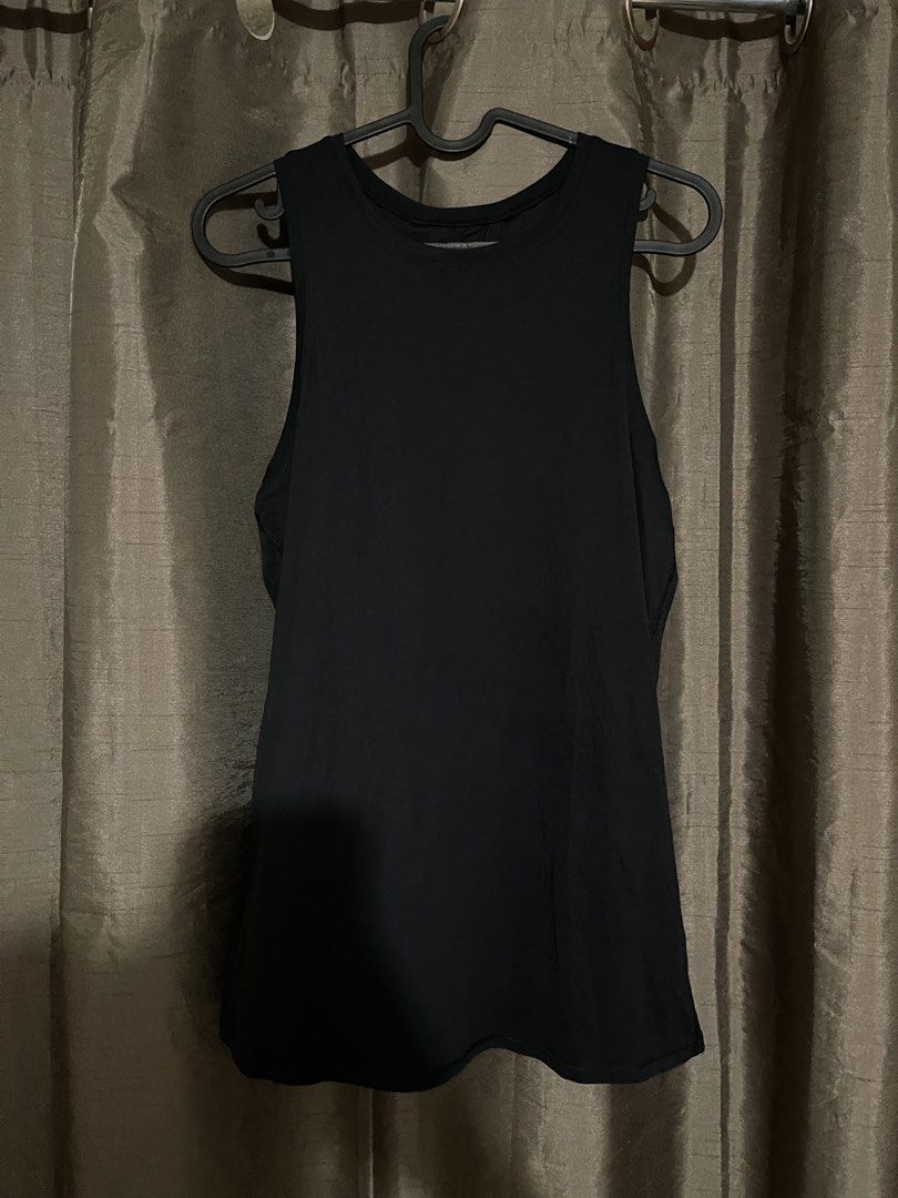 Black Athletic Tank Top Open Back (Category: Activewear) located in Makati City. Submitted by afterpiece (Listing ID 1464480405, Image 1). Description: Black athletic tank top, size 6. Racerback with open back detail. Drifit, lightweight, and breathable. Approx. 17" pit to pit, 26" length. Perfect for workouts, pickle ball or other sports.