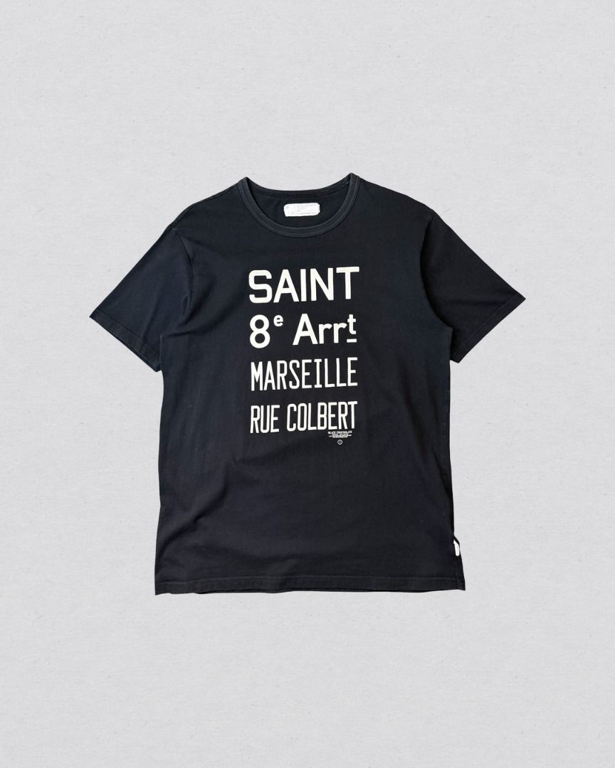 Black Chocoolate Saint tee shirt (Category: Tshirts & Polo Shirts ) located in Cabanatuan. Submitted by argarments.ph (Listing ID 1464480204, Image 1). Description: Tagged: XL on tag, fits large Width 21" | Length 29.5" Condition: Great condition Issue(s): -.