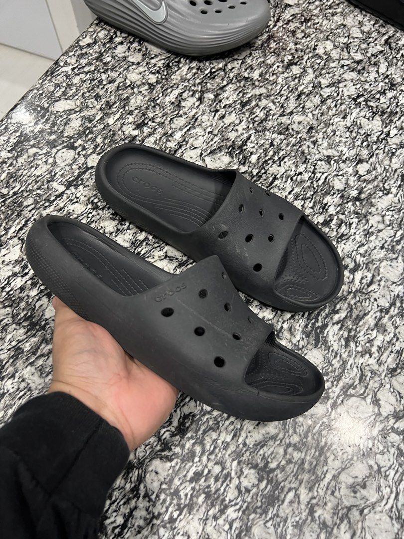 Black Crocs Slides classic. authentic (Category: Slippers & Slides) located in Calasiao. Submitted by pb.supply_v2 (Listing ID 1464547523, Image 2). Description: - Classic black Crocs slides - Easy slip-on and off design - Perfect for casual outings or post-sports relaxation - Shows minor scuffs from normal wear - Plenty of life remaining, great value!.