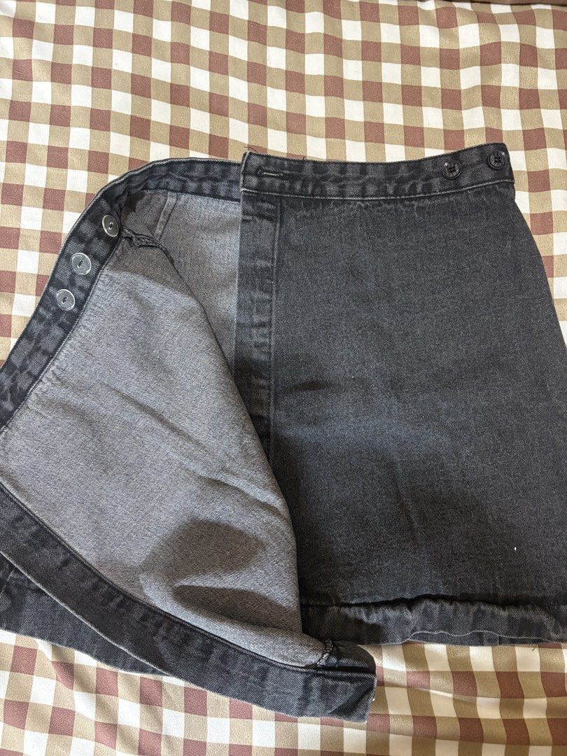 Black Denim Wrap Skirt (Category: Skirts) located in Imus. Submitted by kyla_declutters (Listing ID 1464383675, Image 2). Description: - Black denim wrap skirt, excellent qual!! - Dark wash fabric - Button closure on the side - Best fits size Small to Medium - Ideal for casual outfits - Versatile and easy to style.