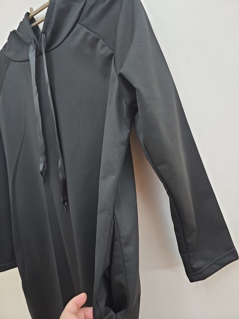 Black Hoodie with Drawstring Hood (Category: Dresses) located in Muntinlupa City. Submitted by shoptitak (Listing ID 1464468448, Image 3). Description: - Basic black hoodie - Long sleeves - Drawstring hood with ribbon ties - Simple and versatile design - Perfect for casual wear - Easy to pair with any outfit.
