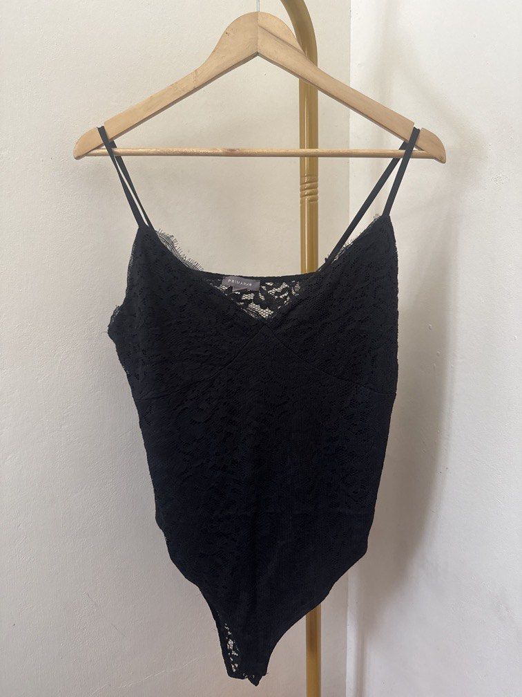 Black Lace Bodysuit (Category: Others Tops) located in Mexico. Submitted by studioleraph (Listing ID 1464403593, Image 1). Description: 🛍️ Perfect for your personal wardrobe 🫶 👗 The actual item being sold is the original garment shown in the product photos. Small differences in fit, drape, color, texture, or details may occur. 💌 Condition: • Preloved; Please wash the items before wearing. • Please manage expectations as these are vintage/pre-