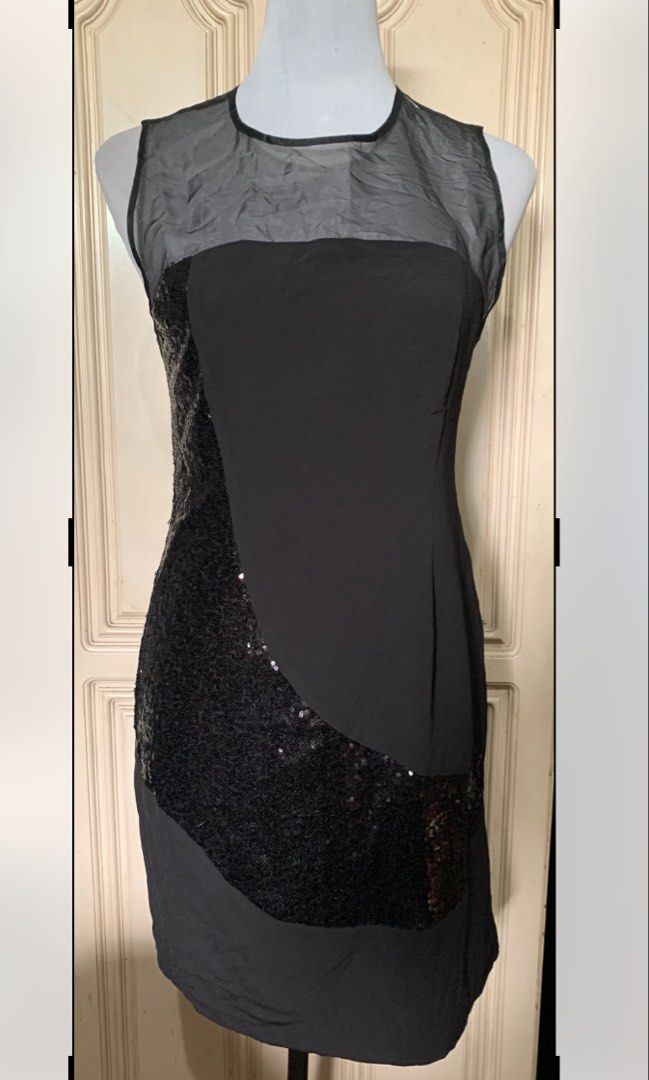 Black Sheer Neckline Sequin Panel Dress (Category: Evening dresses & gowns) located in Quezon City. Submitted by clothingline4sale (Listing ID 1464356205, Image 1). Description: Black w/ Sequence Design Formal Dress Very nice in actual Brand new with plastic Zipper back / Cut tag/ Sequence, mesh design combi/ with lining Size: medium- semiLarge Bust: 34-36” ; Waist: 32-34” ; Length: 34” Very nice in actual .