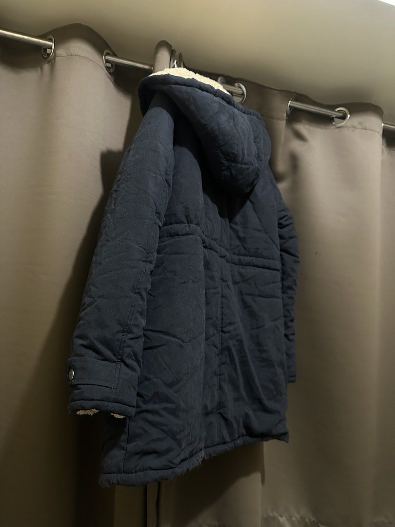 Black Sherpa Lined Parka Jacket with Hood (Category: Coats, Jackets and Outerwear) located in Villasis. Submitted by juliaxgamboa (Listing ID 1464457405, Image 3). Description: - Warm navy blue parka jacket - Cozy sherpa lining for extra warmth - Attached hood - Multiple front pockets - Zipper closure - Ideal for colder weather - Easy to wear and style.