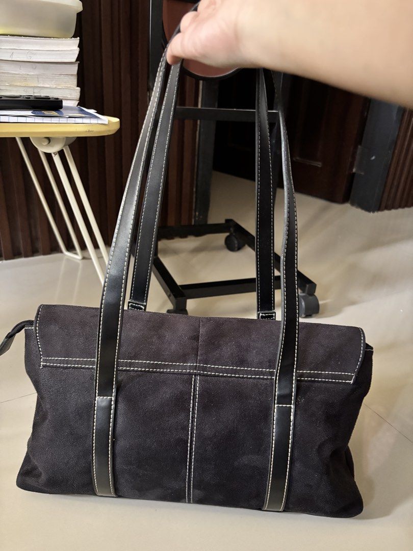 Black Suede Shoulder Bag with Silver Ring Accents (Category: Shoulder Bags) located in Manila. Submitted by guivslove04106 (Listing ID 1464395557, Image 2). Description: - Dark grey suede shoulder bag - no issue Location las pinas.