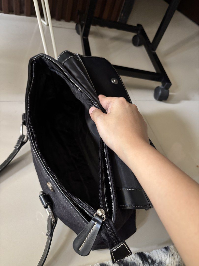 Black Suede Shoulder Bag with Silver Ring Accents (Category: Shoulder Bags) located in Manila. Submitted by guivslove04106 (Listing ID 1464395557, Image 3). Description: - Dark grey suede shoulder bag - no issue Location las pinas.