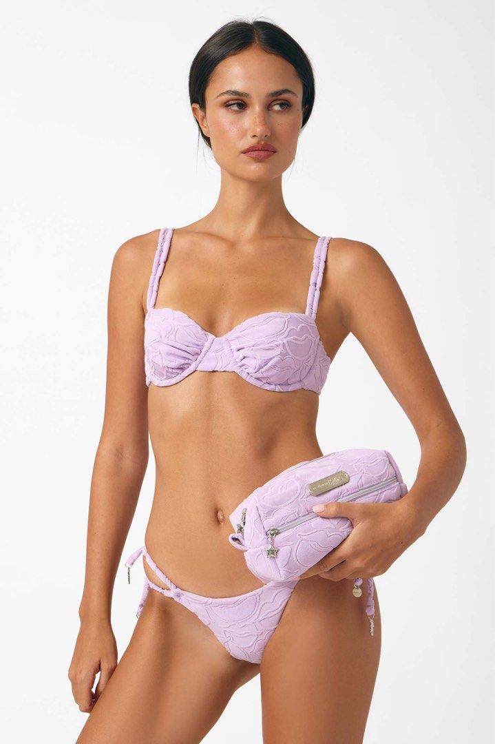 Blackbough Swim Bratz Lilac Textured Bikini Set (Category: Bikinis & Swimsuits) located in Mandaluyong City. Submitted by im.a.shopaholic (Listing ID 1464516343, Image 1). Description: - Adorable lilac bikini set with a cute textured pattern - Flattering bikini top with underwire for push up - Adjustable tie-side bottoms for a perfect fit - Matching pouch not included - Ideal for your next beach trip! Size Medium for Top & Bottom Fits perfectly e