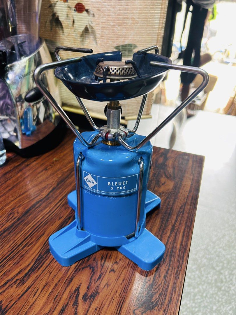 Bleuet S 200 Portable Gas Stove (Category: Cookware & Accessories) located in Manila. Submitted by starbalesukandjapansurplus (Listing ID 1464378331, Image 1). Description: - Portable gas stove, ideal for camping and outdoor adventures. - Compact and easy to set up for quick use. - Compatible with standard gas canisters. - Perfect for cooking on the go. - Minor signs of use on the burner, but fully functional. - Ready for your next adventure!.