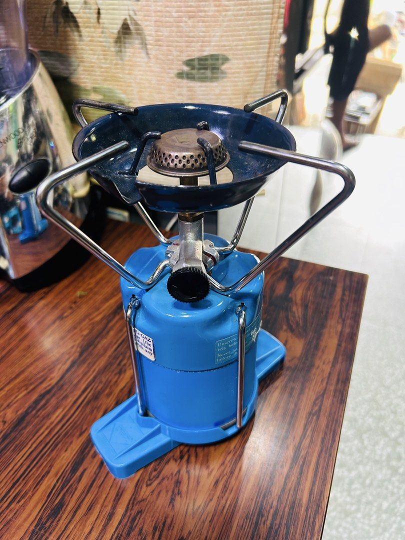 Bleuet S 200 Portable Gas Stove (Category: Cookware & Accessories) located in Manila. Submitted by starbalesukandjapansurplus (Listing ID 1464378331, Image 3). Description: - Portable gas stove, ideal for camping and outdoor adventures. - Compact and easy to set up for quick use. - Compatible with standard gas canisters. - Perfect for cooking on the go. - Minor signs of use on the burner, but fully functional. - Ready for your next adventure!.