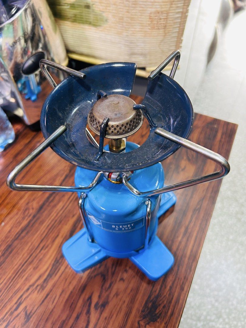 Bleuet S 200 Portable Gas Stove (Category: Cookware & Accessories) located in Manila. Submitted by starbalesukandjapansurplus (Listing ID 1464378331, Image 2). Description: - Portable gas stove, ideal for camping and outdoor adventures. - Compact and easy to set up for quick use. - Compatible with standard gas canisters. - Perfect for cooking on the go. - Minor signs of use on the burner, but fully functional. - Ready for your next adventure!.