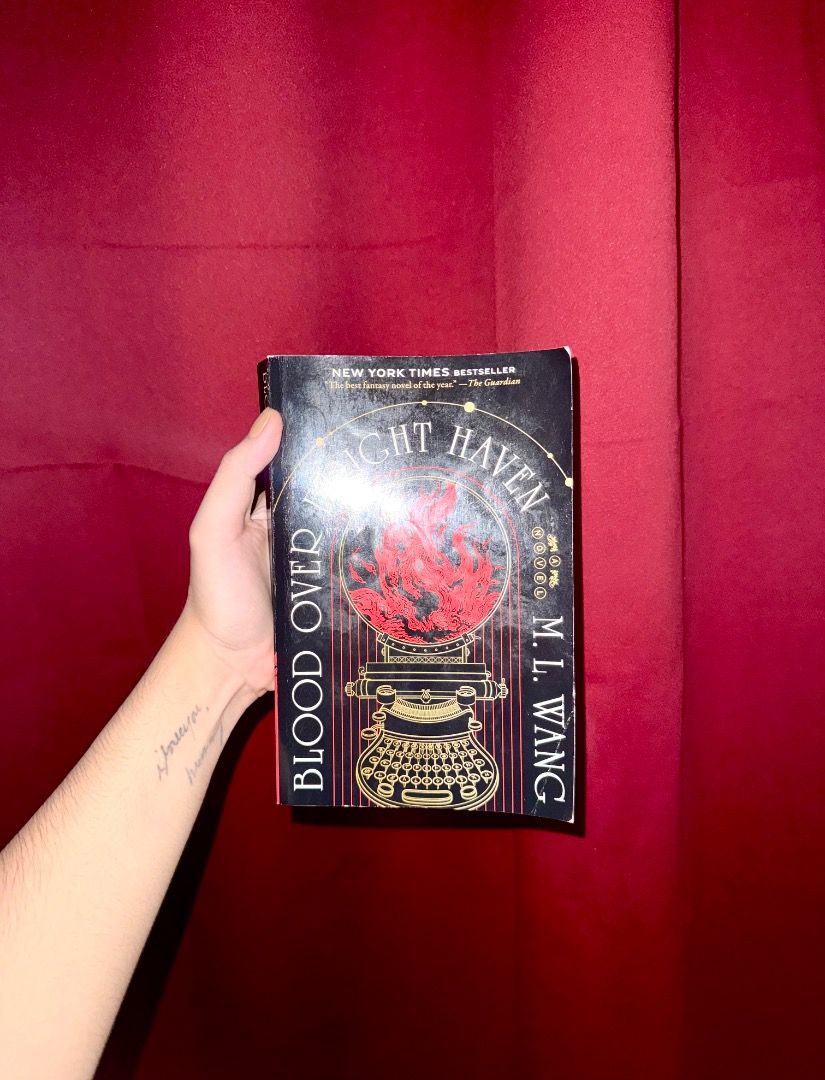 Blood Over Bright Haven by M.L. Wang (Category: Storybooks) located in Tagbilaran City. Submitted by cocoabutterkisses.16 (Listing ID 1464394395, Image 1). Description: - Title: Blood Over Light Haven - Author: M.L. Wang - Genre: Fantasy Novel - Features a unique cover design with a typewriter and globe - Highly recommended read LIKE NEW. PAPERBACK. READ ONCE ONLY. WILL SHIP ONLY. ORIGINAL COPY. BOUGHT FOR 1,300. .