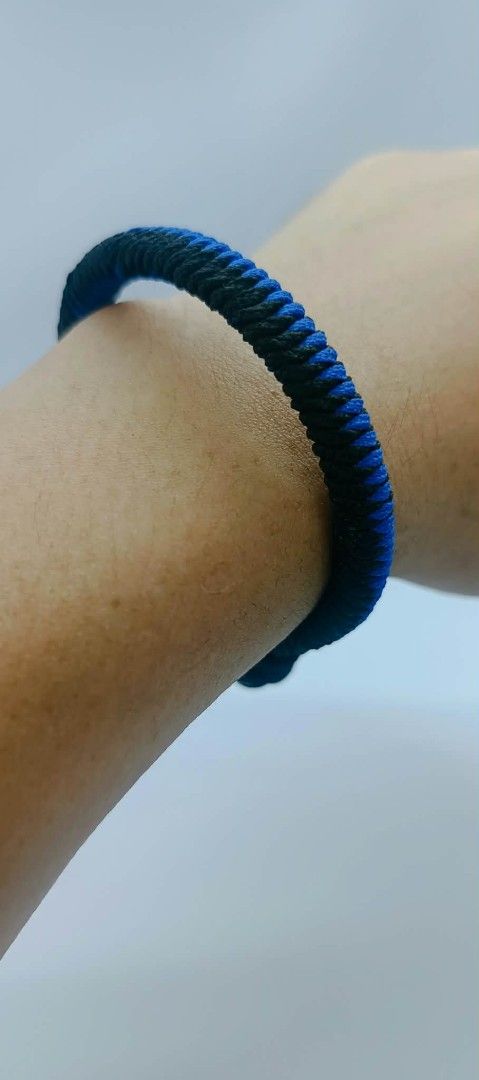 Blue and Black Woven Rope Bracelet (Category: Bracelets) located in Manila. Submitted by kokop3 (Listing ID 1464563067, Image 1). Description: - Cool woven bracelet - Features a mix of blue and black cords - Sturdy rope-like design - Simple and casual accessory - Great for everyday wear - Easy to put on.