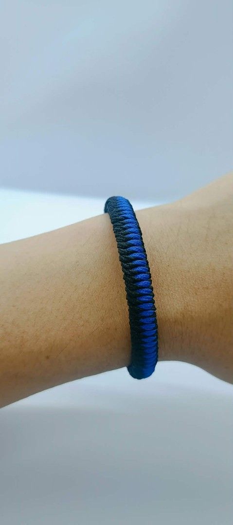 Blue and Black Woven Rope Bracelet (Category: Bracelets) located in Manila. Submitted by kokop3 (Listing ID 1464563067, Image 3). Description: - Cool woven bracelet - Features a mix of blue and black cords - Sturdy rope-like design - Simple and casual accessory - Great for everyday wear - Easy to put on.