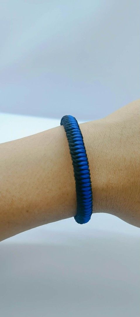 Blue and Black Woven Rope Bracelet (Category: Bracelets) located in Manila. Submitted by kokop3 (Listing ID 1464563067, Image 2). Description: - Cool woven bracelet - Features a mix of blue and black cords - Sturdy rope-like design - Simple and casual accessory - Great for everyday wear - Easy to put on.