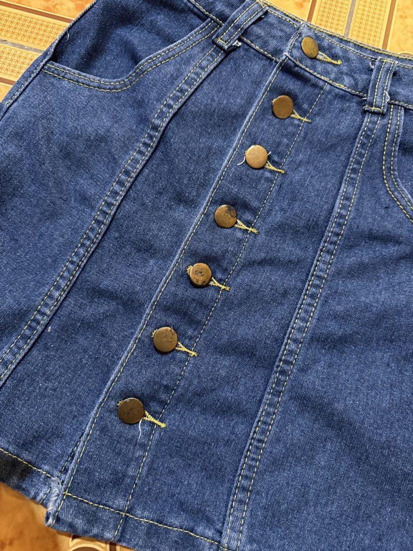 Blue Denim Button-Up A-Line Mini Skirt Size S (Category: Skirts) located in Meycauayan. Submitted by seayurie (Listing ID 1464355886, Image 3). Description: - Cute blue denim mini skirt - A-line cut - Button-up front - Two front pockets - Ideal for casual wear - Easy to pair with tops - Size S.