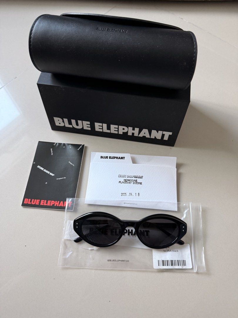 BLUE ELEPHANT NORA BLACK Sunglasses (Category: Sunglasses & Eyewear) located in Taguig. Submitted by marikinaa (Listing ID 1464501936, Image 1). Description: - Authentic BLUE ELEPHANT NORA BLACK sunglasses - Purchased from Hongdae flagship store - Comes with original box, case, and store map - Price is final.