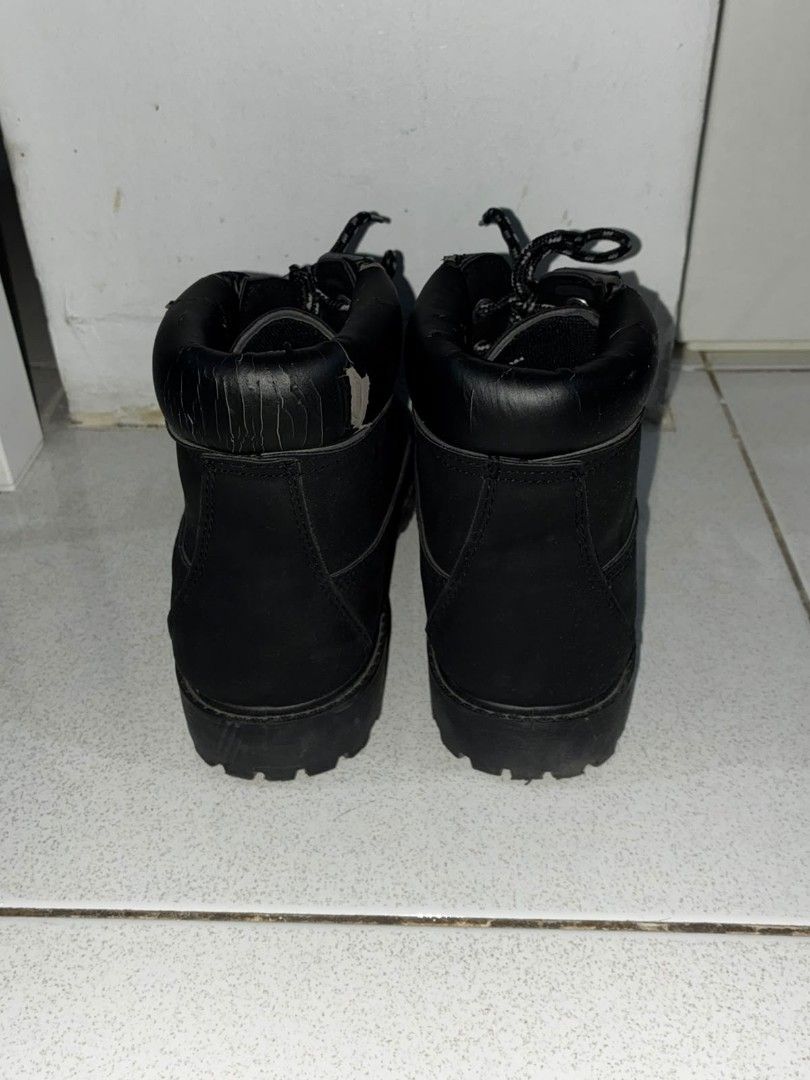 Boots - can be unisex (Category: Boots) located in Mandaluyong City. Submitted by lylforms (Listing ID 1464428834, Image 3). Description: brand: shoe express size: US 8.5, EU 39 used peeling on padded leather near ankle.