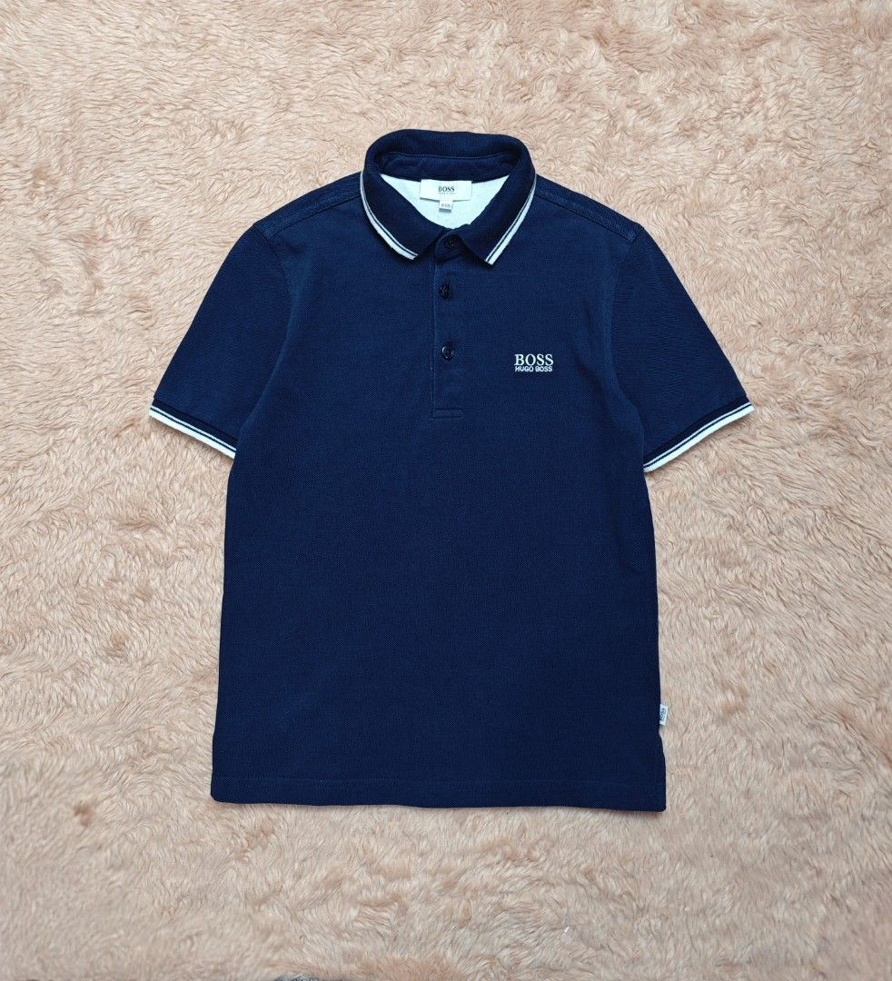 BOSS Kids Poloshirt (Category: Babies & Kids Fashion) located in Imus. Submitted by eykc01 (Listing ID 1464378883, Image 3). Description: Excellent to Like New 8 on tag Fit 5-6yo Armpit to armpit: 13" approx Length: 20" approx.