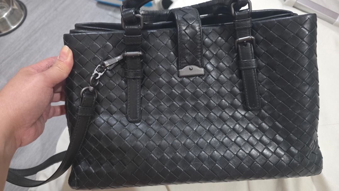 Bottega Venneta Interciatto Roma bag (Category: Shoulder Bags) located in San Mateo. Submitted by luxe_finds543 (Listing ID 1464515005, Image 3). Description: Details: Brand: Bottega Veneta Model: Intrecciato Roma Bag Color: Black Material: Genuine leather Style: Structured handbag with top handles + detachable shoulder strap Condition: Like New / Excellent Condition Authenticity: 100% Authentic Authentication: Comes with Entrupy Certificate of A