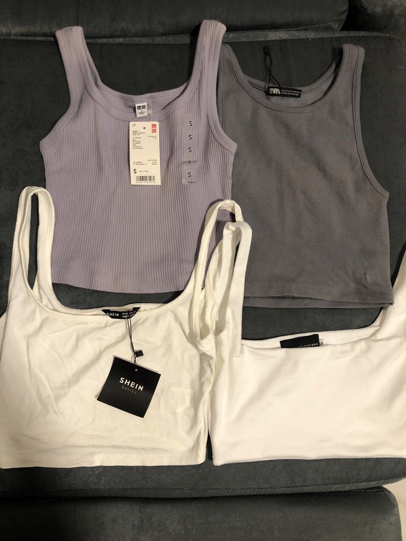 Branded Tops Bundle (xs-s) (Category: Sleeveless) located in Bulacan. Submitted by kkaye_ (Listing ID 1464475615, Image 2). Description: - Bundle of 4 tank/crop tops - Includes: Uniqlo (lilac), Zara (grey), Shein Basics (white), Kimsantiago (white) - All size Xs-S some with tags - Versatile basics for any outfit.
