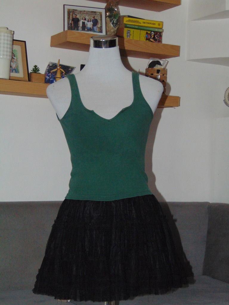 Brandy Melvin Y2k Army Green Crop Top (Category: Sleeveless) located in Angeles City. Submitted by ownit_ac (Listing ID 1464485046, Image 1). Description: Already laundered, ready to wear Brand: BRANDY MELVIN Size: S to semi-M Color may vary due to lighting.