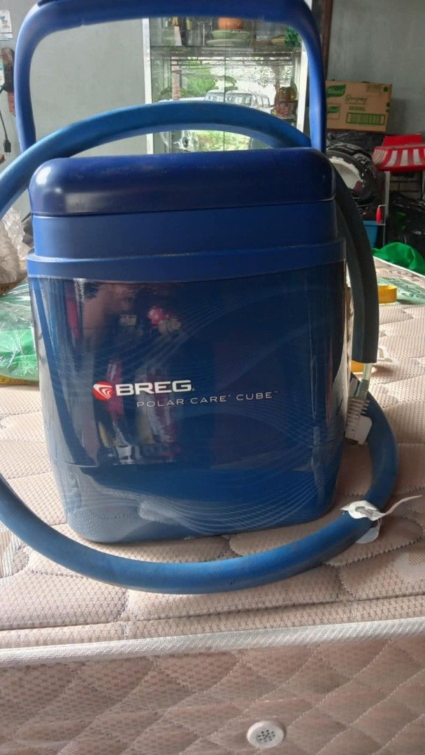 Breg Polar Care Cube Cold Therapy Unit (Category: Medical Supplies & Tools) located in Quezon City. Submitted by madelrivera (Listing ID 1464387688, Image 3). Description: - Breg Polar Care Cube cold therapy unit - Includes cube, hoses, and multi-use pad - Comes with AC adapter and clean filter - Perfect for post-surgery recovery and injury management - Easy to set up and operate - Provides relief from pain and swelling.