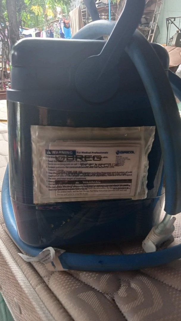 Breg Polar Care Cube Cold Therapy Unit (Category: Medical Supplies & Tools) located in Quezon City. Submitted by madelrivera (Listing ID 1464387688, Image 2). Description: - Breg Polar Care Cube cold therapy unit - Includes cube, hoses, and multi-use pad - Comes with AC adapter and clean filter - Perfect for post-surgery recovery and injury management - Easy to set up and operate - Provides relief from pain and swelling.