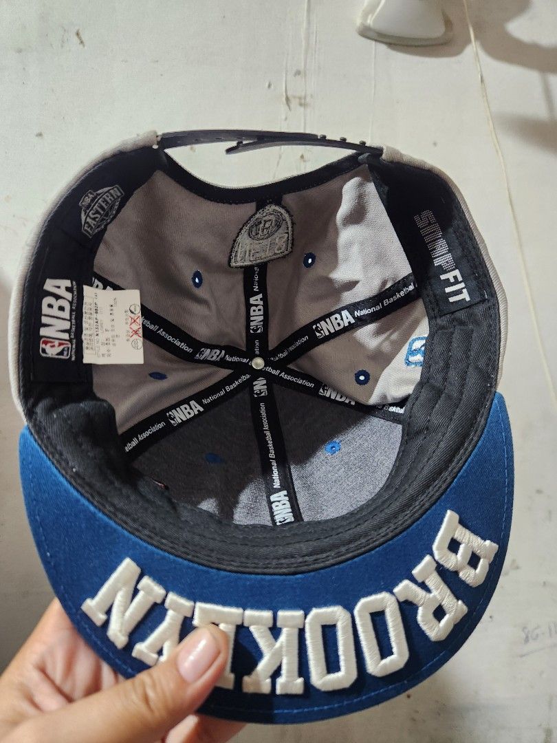 Brooklyn NBA SnapFit Cap (Category: Caps & Hats) located in Quezon City. Submitted by amber___18 (Listing ID 1464410259, Image 1). Description: - Grey and blue Brooklyn NBA cap - SnapFit adjustable strap - Features NBA logo and 'Brooklyn' text - Perfect for basketball fan.