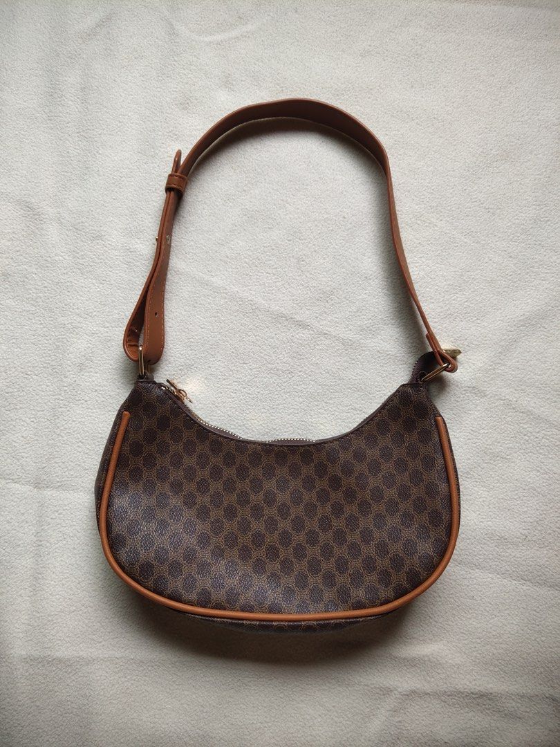 Brown Monogram Shoulder Bag (Category: Shoulder Bags) located in Caloocan City. Submitted by angelinee123 (Listing ID 1464384879, Image 1). Description: Never been used •Payment methods: Gcash (item price + sf) • Payment first policy • Delivery option: - J&t delivery : 2-3 days depends on loc - Lalamove: same day delivery - meetup: 5th avenue lrt station only (cod avail) .