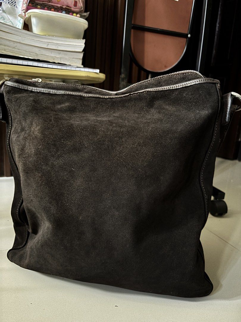 Brown Suede Leather Shoulder Bag with Silver Hardware (Category: Shoulder Bags) located in Manila. Submitted by guivslove04106 (Listing ID 1464396348, Image 2). Description: - Dark brown suede leather shoulder bag - big laptop can be fit Location las pinaa.