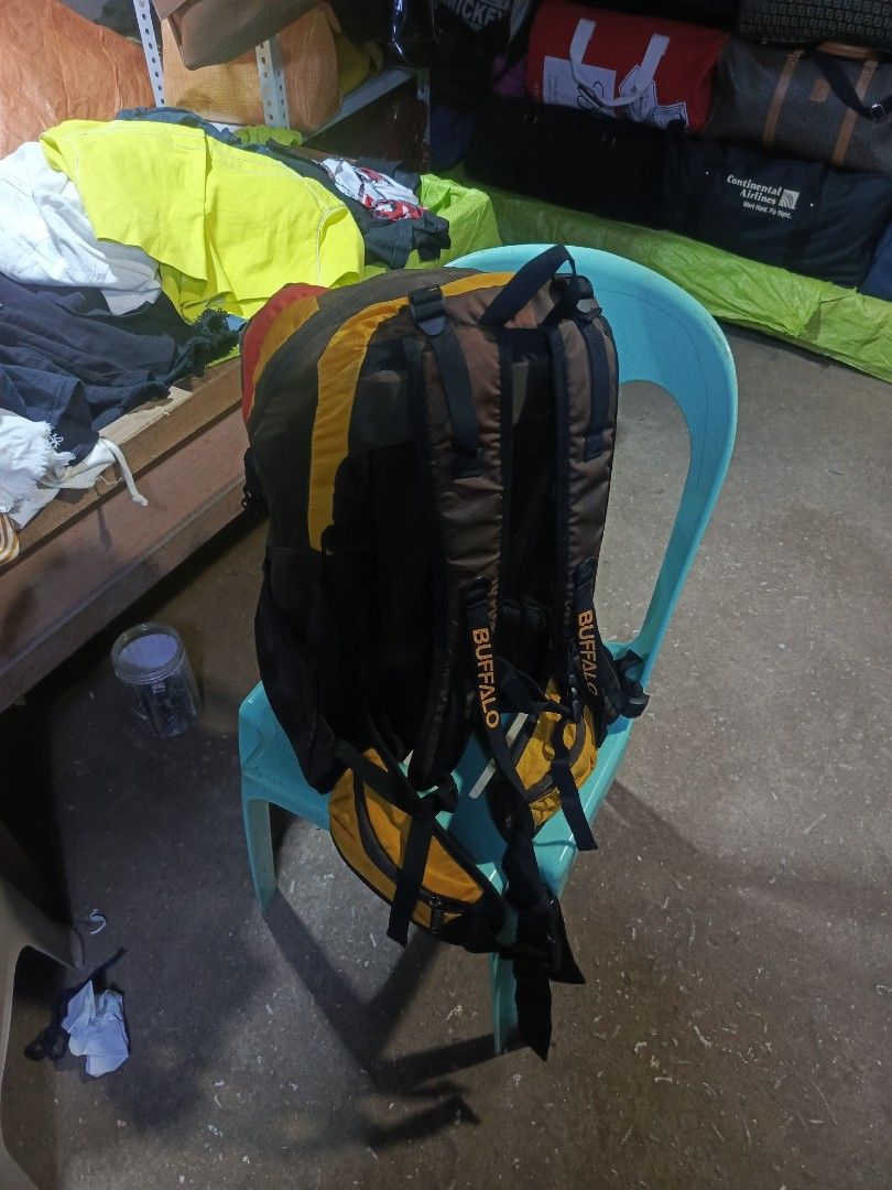 Buffalo Outdoor Hiking Backpack Yellow Brown (Category: Backpacks) located in City of Isabela. Submitted by warmbird.d06e6f (Listing ID 1464428563, Image 3). Description: - Buffalo brand backpack - Ideal for hiking and travel - Multiple pockets and gear straps - Yellow and brown colorway - Zippers in good working condition - Adjustable straps for comfort - Suitable for day trips or weekend getaways.