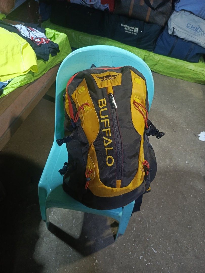 Buffalo Outdoor Hiking Backpack Yellow Brown (Category: Backpacks) located in City of Isabela. Submitted by warmbird.d06e6f (Listing ID 1464428563, Image 2). Description: - Buffalo brand backpack - Ideal for hiking and travel - Multiple pockets and gear straps - Yellow and brown colorway - Zippers in good working condition - Adjustable straps for comfort - Suitable for day trips or weekend getaways.