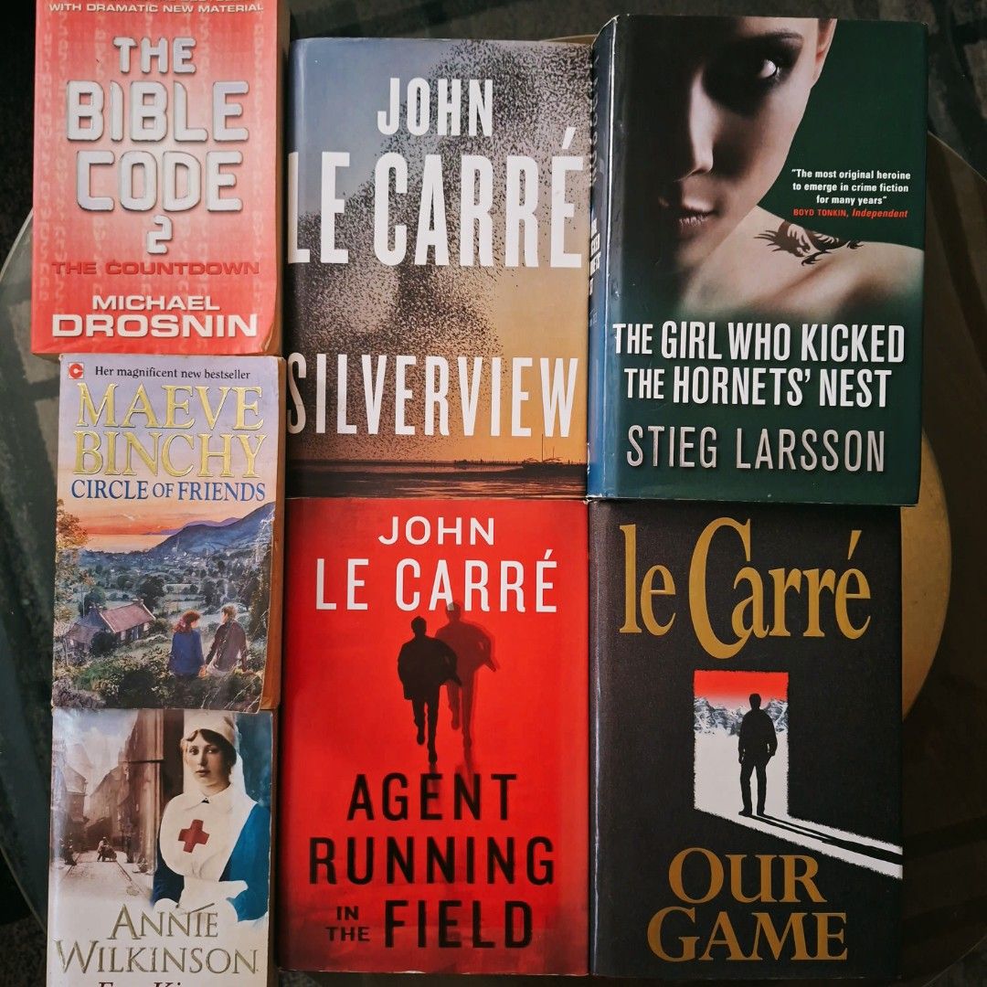 Bundle: John le Carré & Stieg Larsson Books (Category: Storybooks) located in Marikina City. Submitted by hellobookish.ph (Listing ID 1464442910, Image 1). Description: Take all for ₱180 preloved hardcover thriller novels John le Carré and Stieg Larsson + free 3 random books (with tanning and foxing).