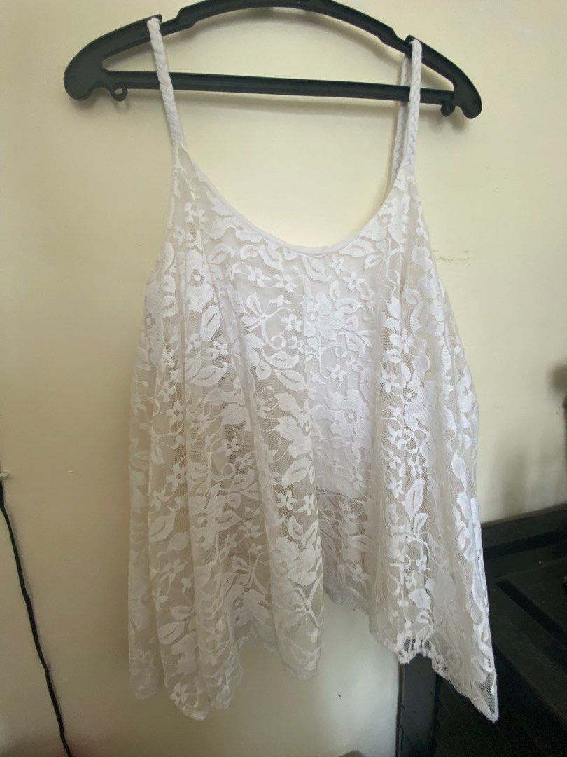 Bundle of 5 Tops - Various Styles and Colors (Category: Blouses) located in Cavite. Submitted by goldenbear.3e82a9 (Listing ID 1464403539, Image 3). Description: - Bundle of 5 stylish tops - Includes: pink square neck, blue graphic tank, white lace cami, burgundy faux leather halter, and pink crochet cami - Great variety for mixing and matching - Suitable for casual or dressy occasions.