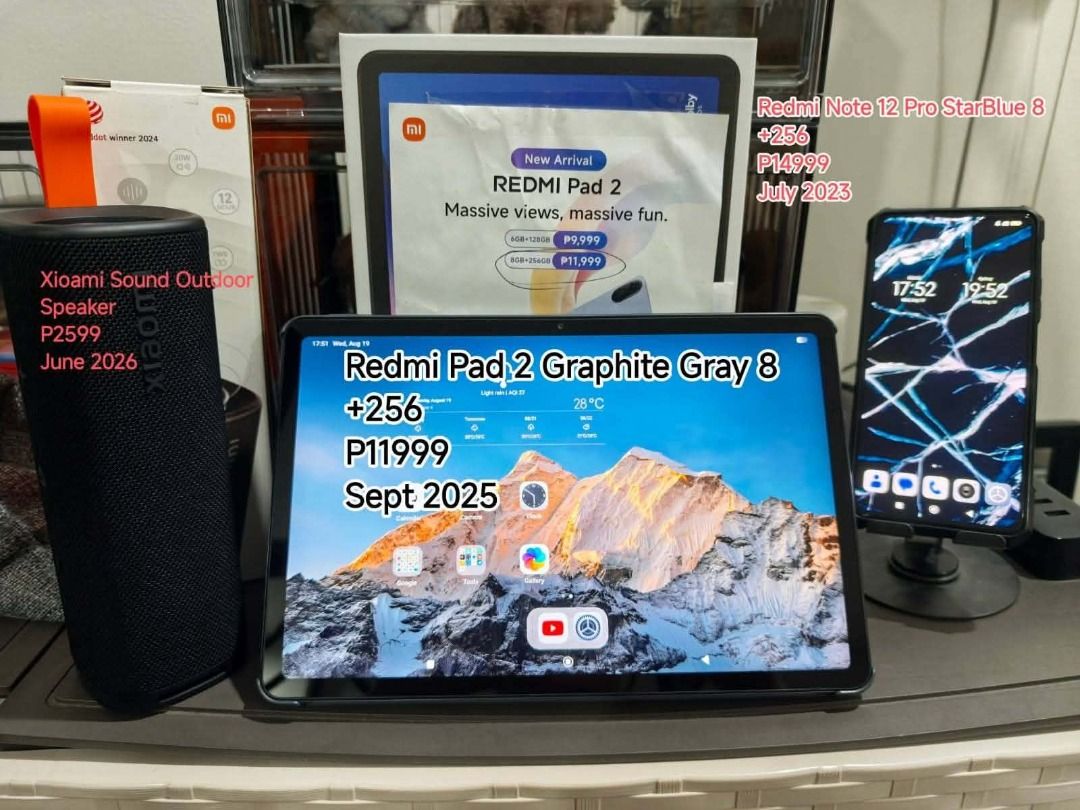 Bundle promo (Category: Android) located in Caloocan City. Submitted by happybird_a076d5 (Listing ID 1464379916, Image 1). Description: - Bundle includes Redmi Pad 2 in Graphite Gray with 256GB storage. - Comes with a Xiaomi Sound Outdoor Speaker. - Also includes a Redmi Note 12 Pro in StarBlue with 256GB storage. - Great value tech package..