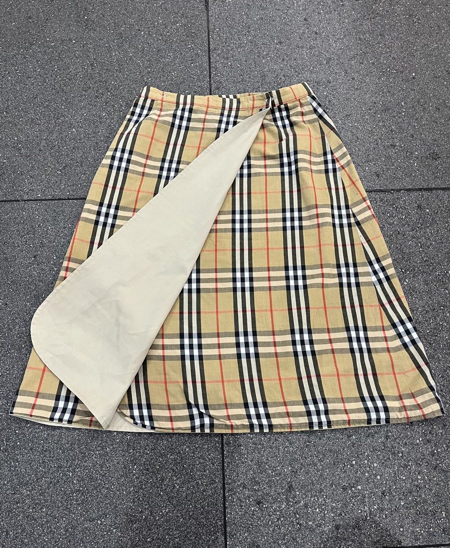 Burberry (Category: Skirts) located in Pasay City. Submitted by trash_or_treasure.543 (Listing ID 1464388119, Image 3). Description: Vintage Burberry Nova Plaid Long Skirt Authentic Dimension: Width: 30 Length: 26 Note: Can adjust the buttons depends on your waist line .