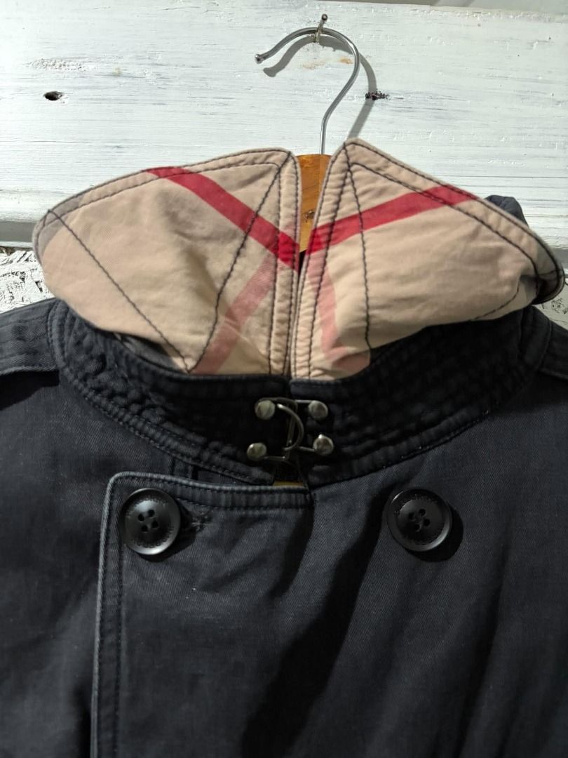 Burberry Black Double-Breasted Trench Coat (Category: Coats, Jackets and Outerwear) located in Caloocan City. Submitted by silentstorm_cf9f0a (Listing ID 1464509902, Image 3). Description: Style: Double-breasted trench coat with waist tie Color: Faded / Charcoal Black Size: Tagged as XXXL Features: Shoulder epaulets, gun flap, belted cuffs, checked pattern interior lining accent. Condition: Gently worn with a nice vintage, broken-in wash look. Is
