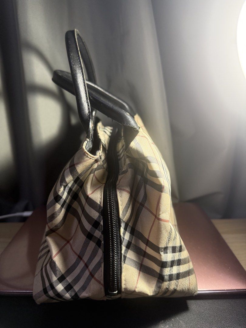 Burberry Nova Check Blue Label beige bag (Category: Tote Bags) located in Pasig City. Submitted by fancytracy (Listing ID 1464464917, Image 2). Description: Brand: Burberry Blue Label Model: Burberry Nova Check Blue Label beige bag Color: Beige Hardware: Silver Material: Nylon Condition: Good Dimensions: 25 x 16 x 18 cm (L x W x H) Handle drop: 10 cm Thrifted from Japan Pre-owned Burberry Nova Check Blue Label beige bag This pre-owned Burberry No