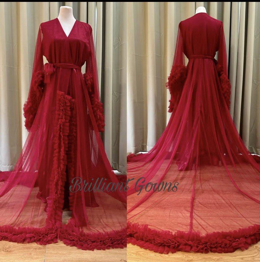 Burgundy Tulle Robe with Ruffle Details (Category: Evening dresses & gowns) located in Candon. Submitted by youngfire_805379 (Listing ID 1464378906, Image 1). Description: - Beautiful burgundy tulle robe - Long sleeves with ruffled cuffs - Matching ruffled hem - Comes with a tie belt for a cinched waist - Long and flowing train, perfect for photos - Ideal for special occasions or boudoir shoots.