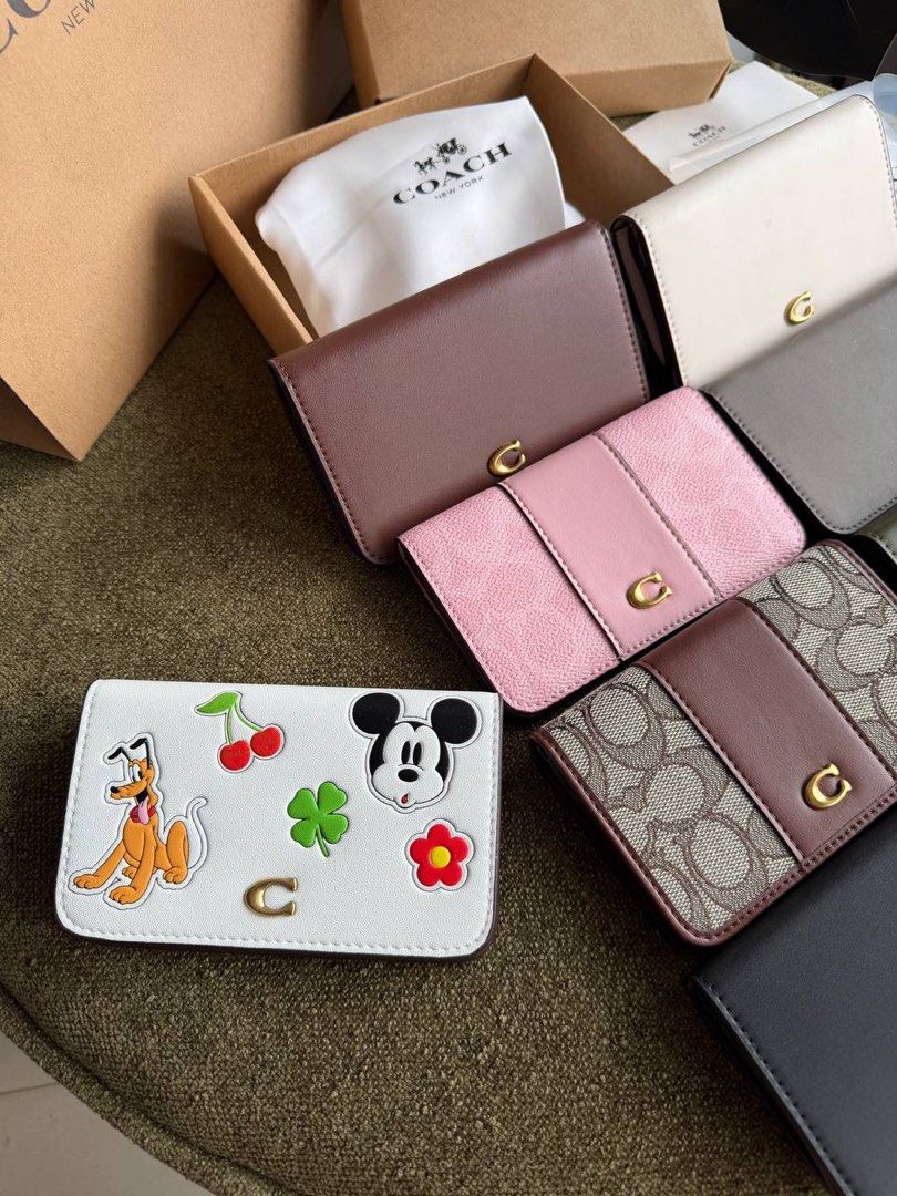 C0ach Slimcard Case (Category: Wallets & Card holders) located in Manila. Submitted by whimsy.finds (Listing ID 1464530640, Image 2). Description: Payment first basis via Gcash / Maribank / Maya Ship via JNT ONLY *No rush shipping *Open for bulk order.