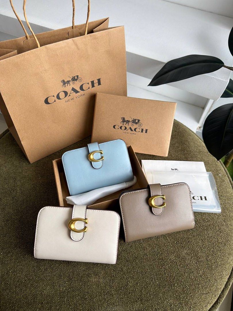 C0ach Tabby Bifold Wallet (Category: Wallets & Card holders) located in Manila. Submitted by whimsy.finds (Listing ID 1464530230, Image 1). Description: Payment first basis via Gcash / Maribank / Maya Ship via JNT ONLY *No rush shipping *Open for bulk order .