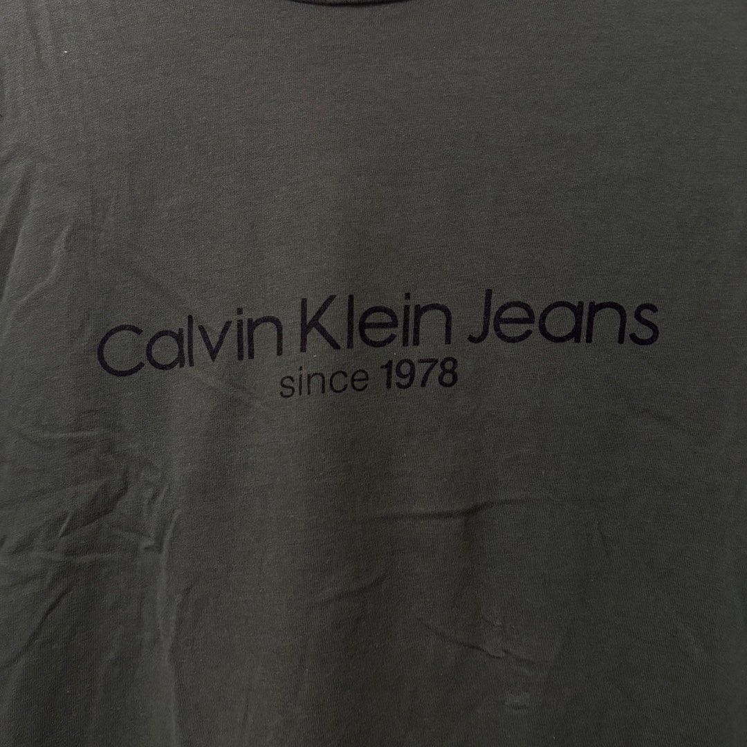 Calvin Klein Jeans Green Shirt (Category: Tshirts & Polo Shirts ) located in Bulacan. Submitted by laleesa_ (Listing ID 1464434367, Image 2). Description: 23 width Up to XL Men.