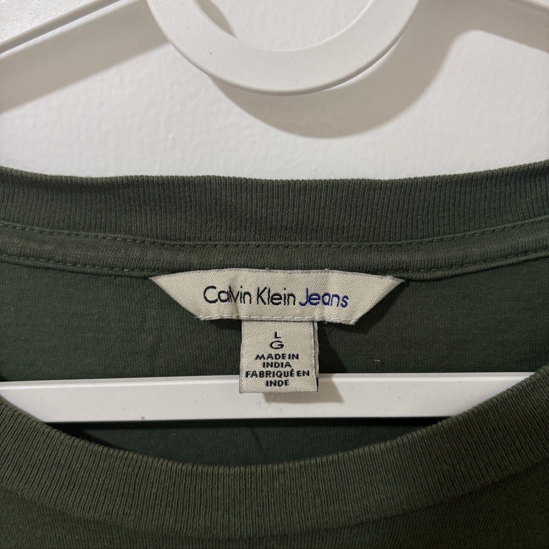 Calvin Klein Jeans Green Shirt (Category: Tshirts & Polo Shirts ) located in Bulacan. Submitted by laleesa_ (Listing ID 1464434367, Image 3). Description: 23 width Up to XL Men.