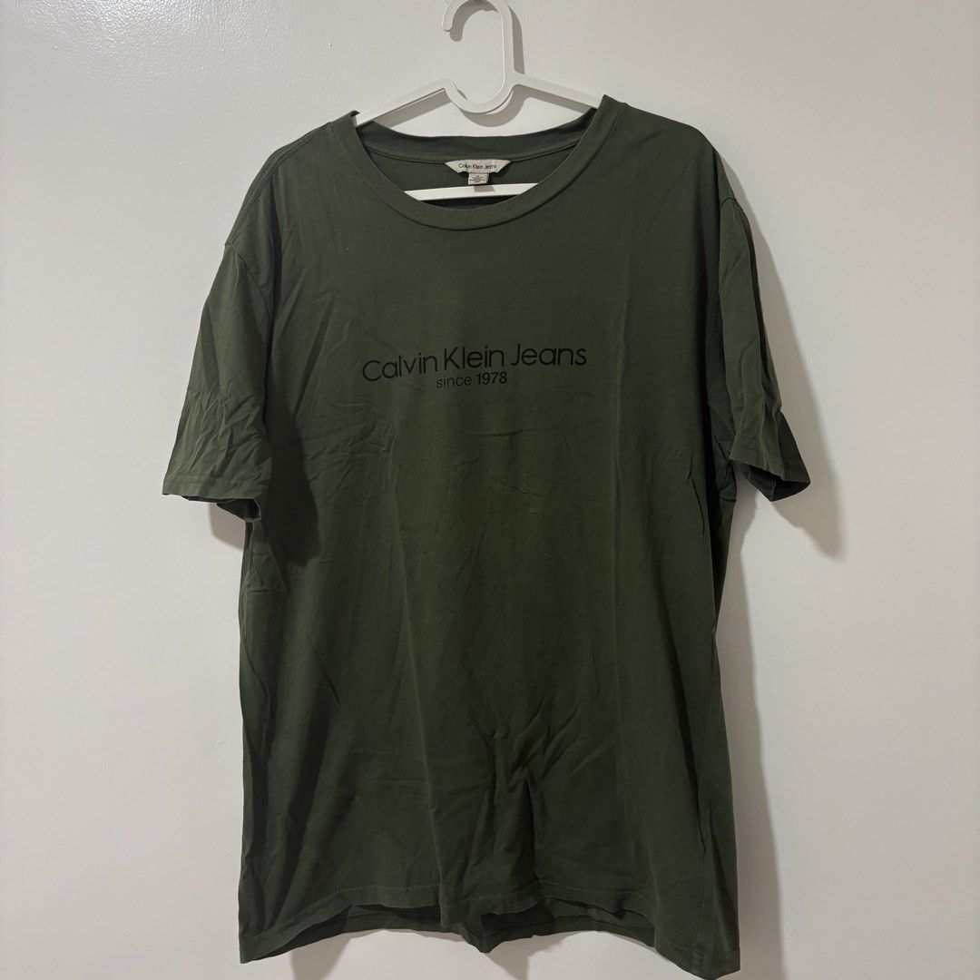 Calvin Klein Jeans Green Shirt (Category: Tshirts & Polo Shirts ) located in Bulacan. Submitted by laleesa_ (Listing ID 1464434367, Image 1). Description: 23 width Up to XL Men.