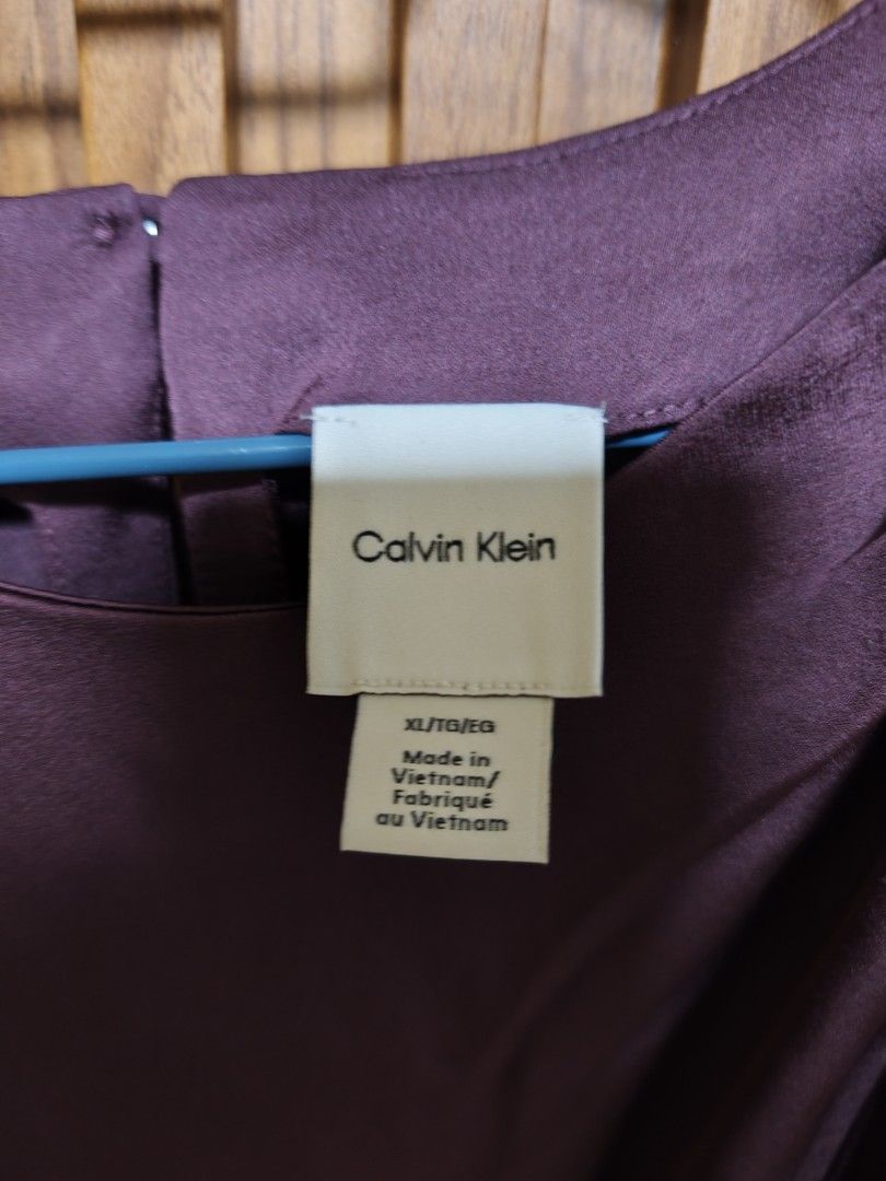 Calvin Klein sleeveless (Category: Blouses) located in General Mariano Alvarez. Submitted by plussize_republic (Listing ID 1464412212, Image 3). Description: brand new without hangtag actual color (more on maroonish) width:24inches best fit to 3x to 4x new arrival sf c/o buyer.